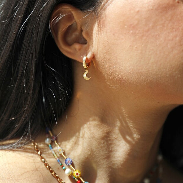 Moon and Sun Huggie Hoop Earrings in Gold