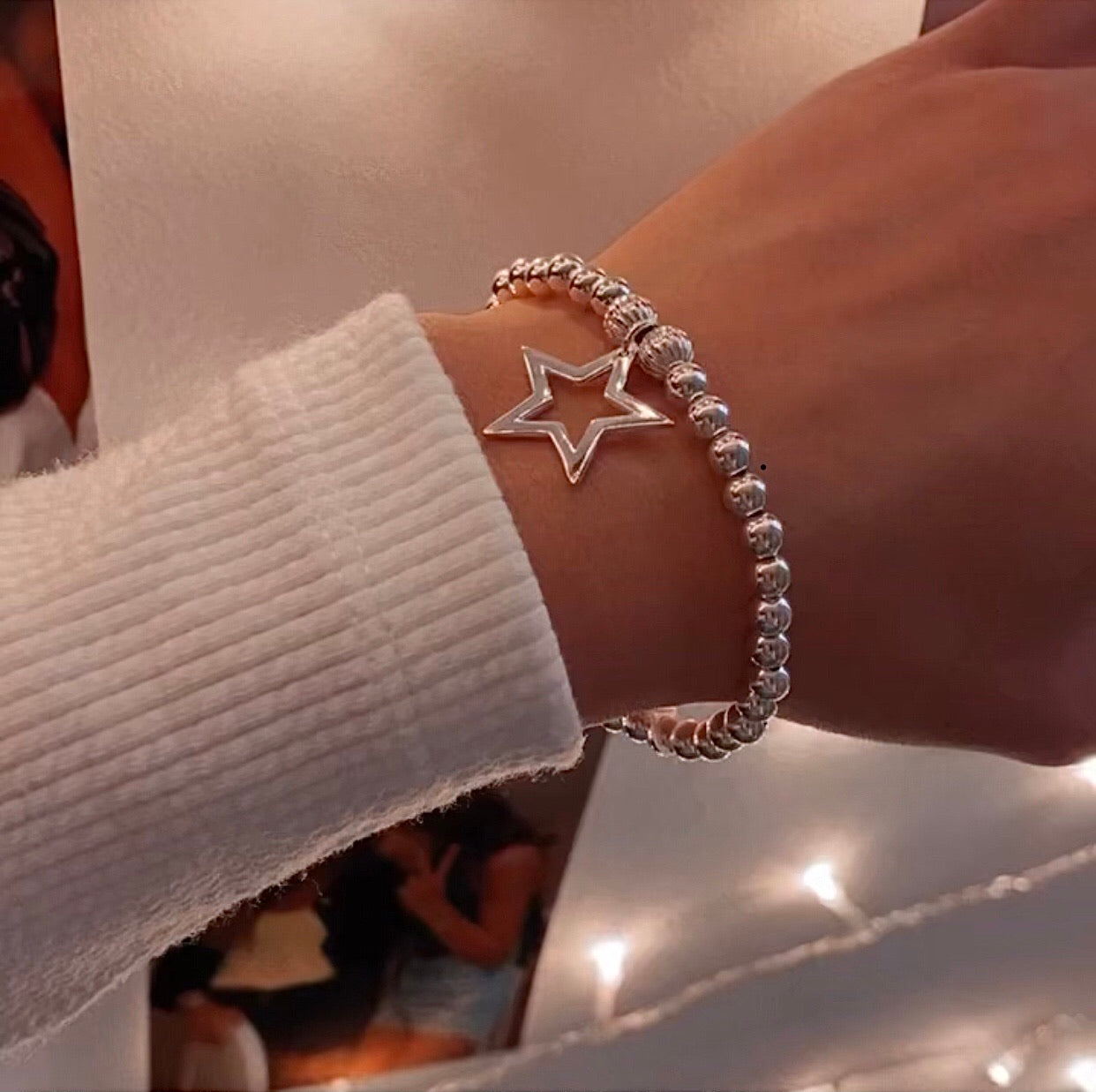 Handmade sterling silver open star charm bracelet